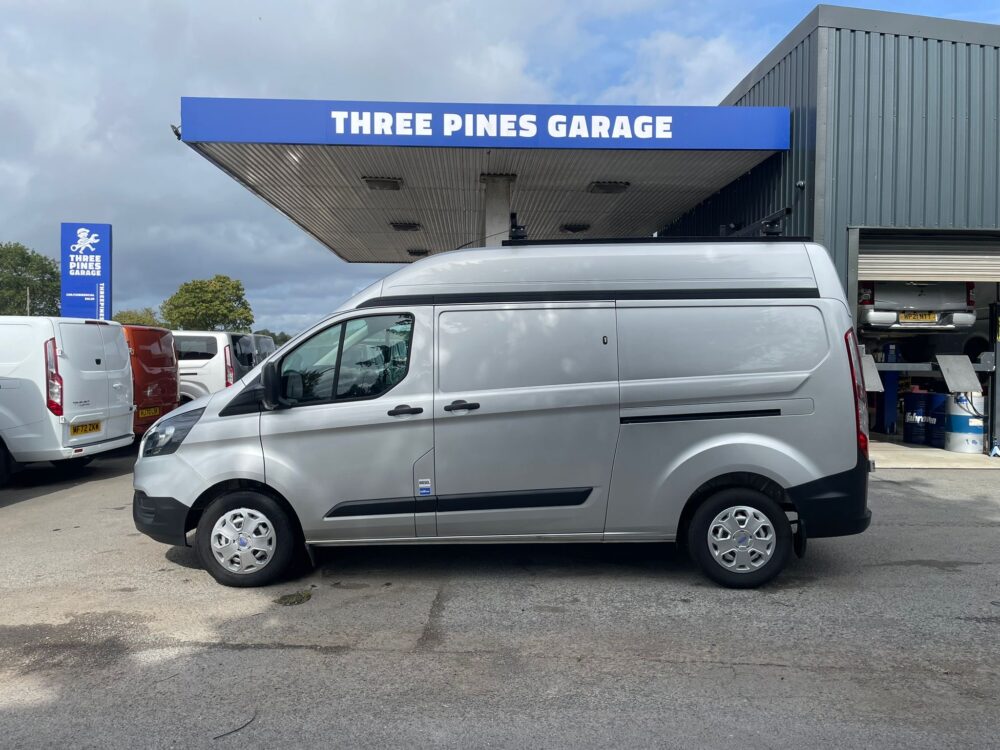 Silver Ford Transit Custom L2 high roof on the forecourt